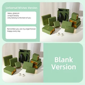 Elegant emerald green jewelry packaging set with gold foil text and matching paper gift bags