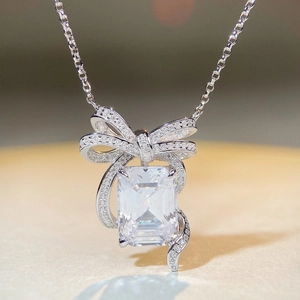 Elegant S925 silver bow necklace with a large radiant rectangular crystal pendant