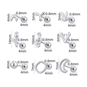 Set of 16G stainless steel cartilage earrings with moon, tulip, and music note designs