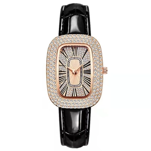 Luxury rose gold tonneau watch for women with rhinestone inlay and black leather strap