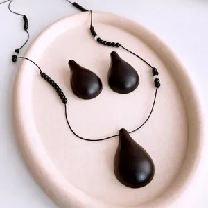 Minimalist resin beaded waterdrop pendant necklace and earrings set in black