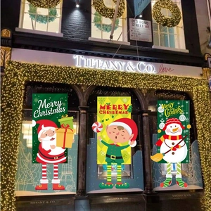 Three Christmas hanging banners with Santa, Snowman and Elf designs for wall decoration