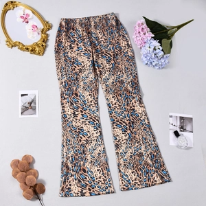 Detailed view of leopard print flare pants with vintage retro style pattern and texture