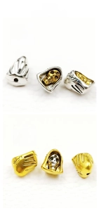 Detail of skull bead charms measuring 12x10mm with 1.2mm hole in gold and silver finish