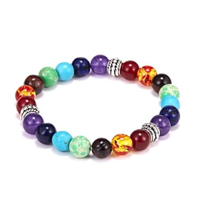 Detailed shot of rainbow beaded bracelet with silver spacers and elastic cord