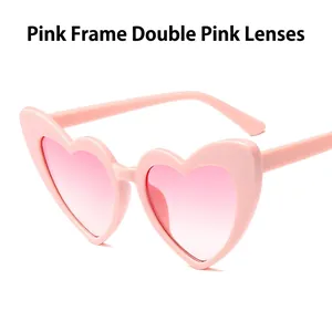 Pink heart shaped sunglasses for women with stylish pink gradient lenses and resin frame
