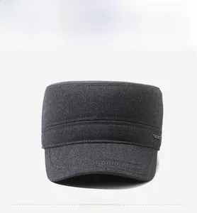 Detailed front view of deep gray men's winter cadet cap with metal accent and thick wool fabric