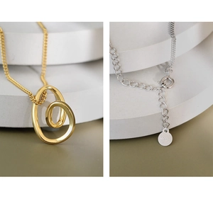 Detailed close-up of S925 silver necklace pendant with lobster clasp and adjustable chain