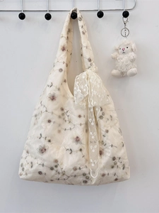 Chic beige tulle tote bag with floral embroidery and a large lace bow decoration