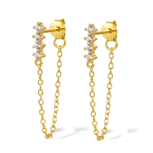 Detail view of gold chain earrings with four cubic zirconia stones in drop design