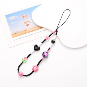 Pink and black Y2K beaded phone charm strap with heart flower and butterfly beads