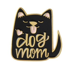 Close-up of black and gold enamel cat badge featuring dog mom engraving and pink accents