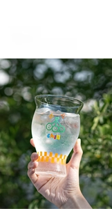 Detailed view of a 550ml glass cup with chill text and checkerboard pattern