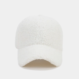 Close-up of white fleece baseball cap showing soft thickened lamb wool texture and stitching