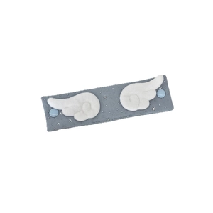Light blue fabric headband with white plush angel wings and silver star patterns
