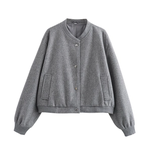 Detailed flat lay of a grey wool texture bomber jacket with silver snap buttons and ribbed trim