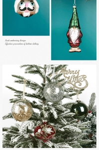 Detailed view of glass Nutcracker ornaments and colored balls on a Christmas tree