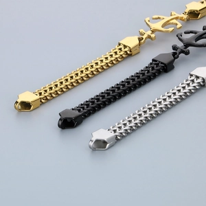 Detailed view of stainless steel Cuban link bracelets in gold, black, and silver with anchor clasps
