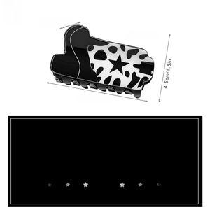 Detailed size specifications of cow print hair claw clip with black star pattern