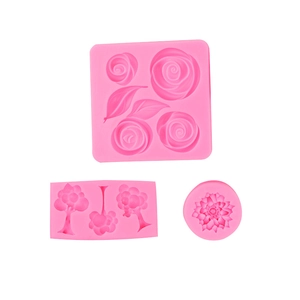 Pink silicone fondant molds set with rose flower and leaf patterns for cake decoration