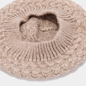 Classic beige cable knit beret hat for women with warm ribbed wool texture and vintage style