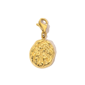 Detailed view of a golden stainless steel evil eye pendant with lobster clasp and texture