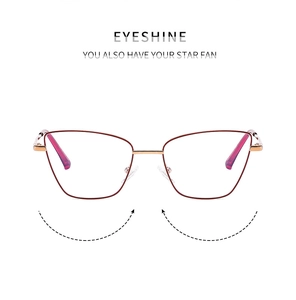Front view of stylish cat-eye glasses frame in burgundy metal with rose gold accents
