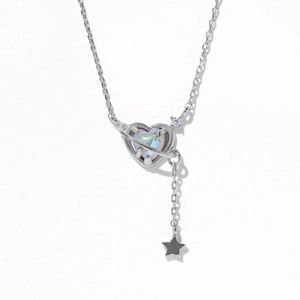 Silver heart planet necklace with iridescent gemstone and star tassel pendant