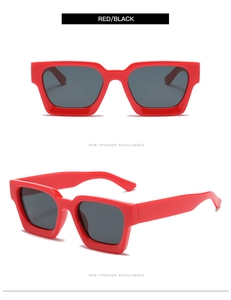 Vista detallada de las monturas cuadradas rojas y lentes oscuras para un estilo retro
