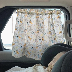 Detailed view of breathable cotton car sunshade with cute cartoon animal patterns