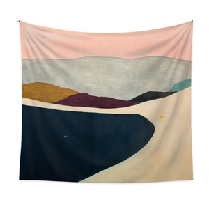 Detail of bohemian tapestry with abstract geometric landscape art on soft fabric