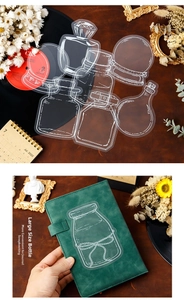 Macro detail of large PET bottle stickers with white outlines for scrapbooking and DIY crafts
