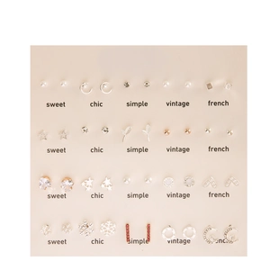 20 pairs of minimalist pearl stud earrings set with heart and snowflake designs