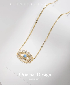 Detail of s925 silver evil eye necklace featuring blue crystal and sparkling cubic zirconia