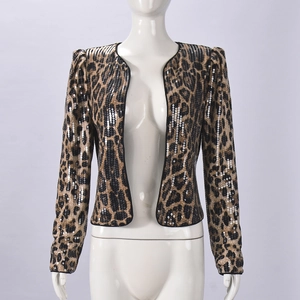 Detailed view of sequined leopard print blazer featuring sparkling textures and padded shoulders