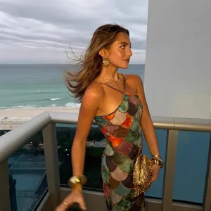 Sleeveless halter maxi dress with colorful fishtail sequins for beach parties