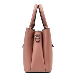 Chic mauve pink soft faux leather tote bag with grainy texture and silver metal side rings