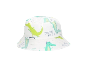 Close-up of white sun hat featuring green cartoon crocodiles and fun printed phrases