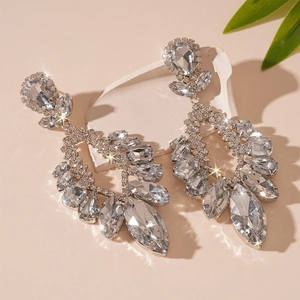 Luxurious silver drop earrings with floral rhinestones and sparkling crystal accents