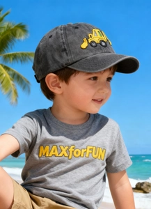 Detail of kids washed cotton baseball cap with bright yellow excavator embroidery