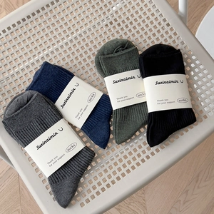 Four pairs of ribbed cotton mid-calf socks in grey, navy, olive and black for men