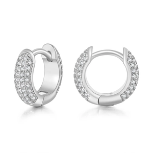 Close-up of silver-tone hoop earrings with pave set white cubic zirconia crystals