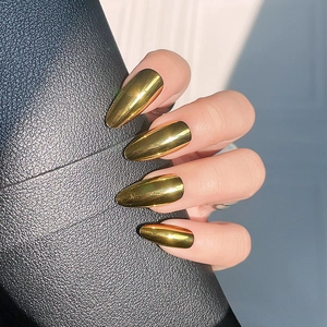 Glossy gold mirror almond shape press-on nails with metallic chrome finish on hand