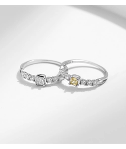 Detail showing S925 hallmark on silver ring bands with square princess cut zircon stones