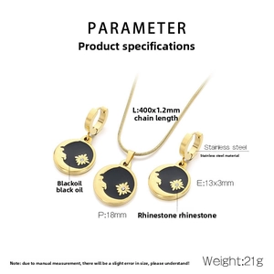 Detailed view of butterfly rose stainless steel jewelry set with black enamel and rhinestones