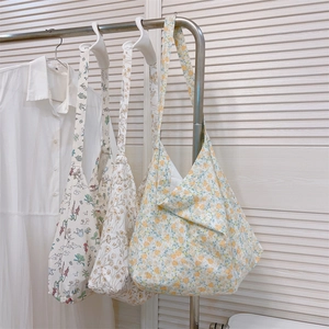 Detailed comparison of three floral cotton tote bags with different artistic flower patterns