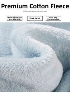 Detailed close-up of soft light blue fleece fabric for warm pet bathrobes and clothes