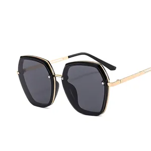 Fashionable hexagonal black and gold oversized sunglasses with metal temples for a chic look