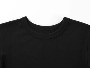 Detailed view of stitching on black crew neck modal sports t-shirt with knit texture