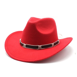 Detailed close-up of the red wool felt cowboy hat featuring a black faux leather band